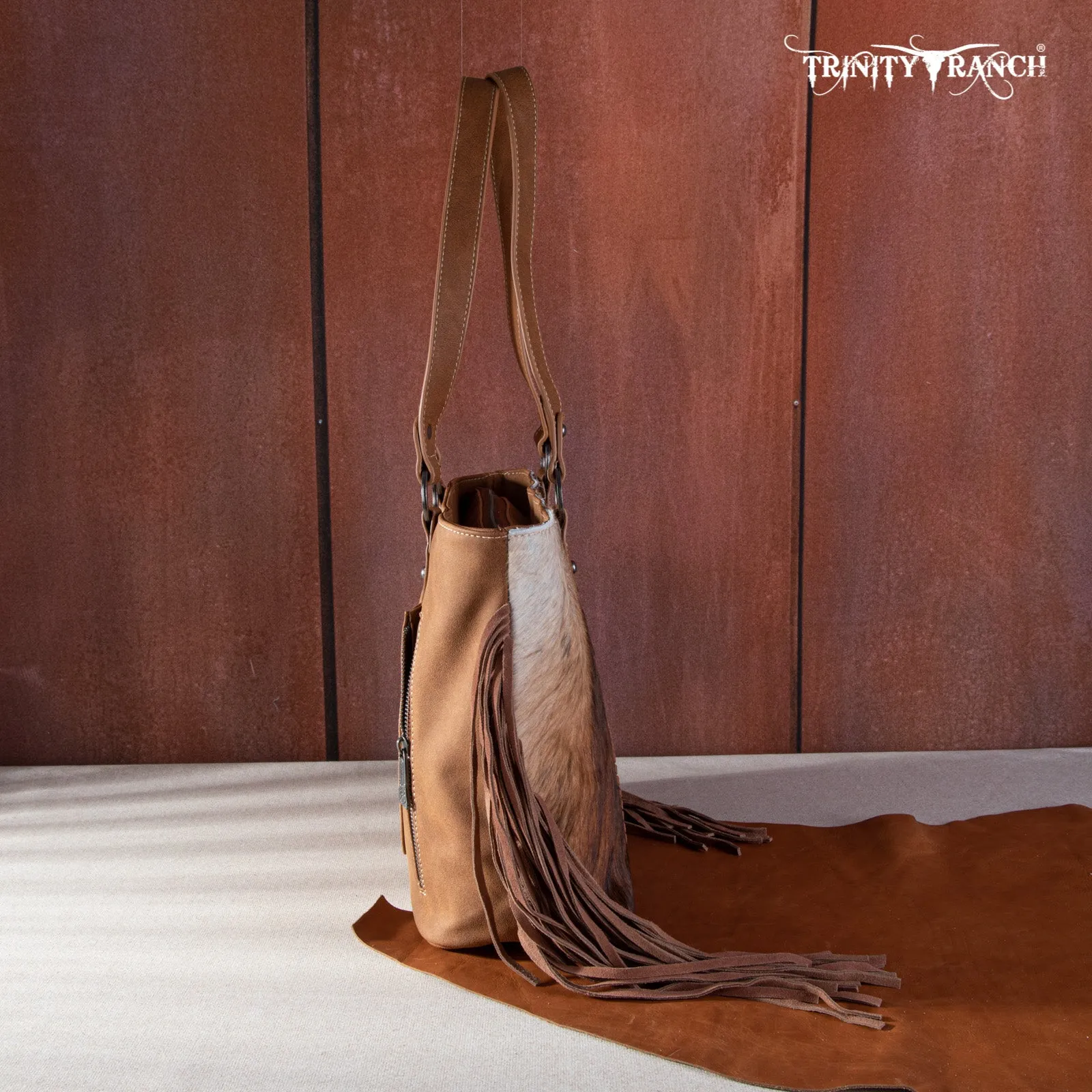 TR146G-8317 Trinity Ranch Hair On Cowhide Concealed Carry Tote
