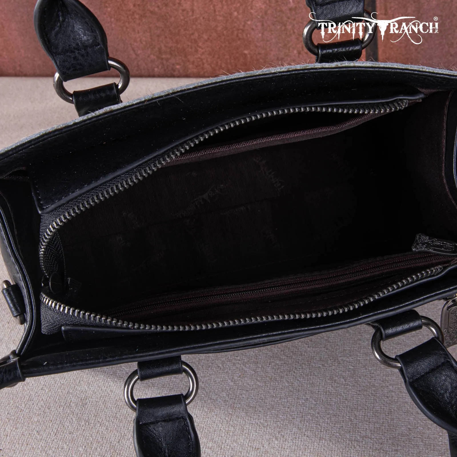 TR164-8250A  Trinity Ranch Hair On Cowhide Tooling Concealed Carry Tote/Crossbody