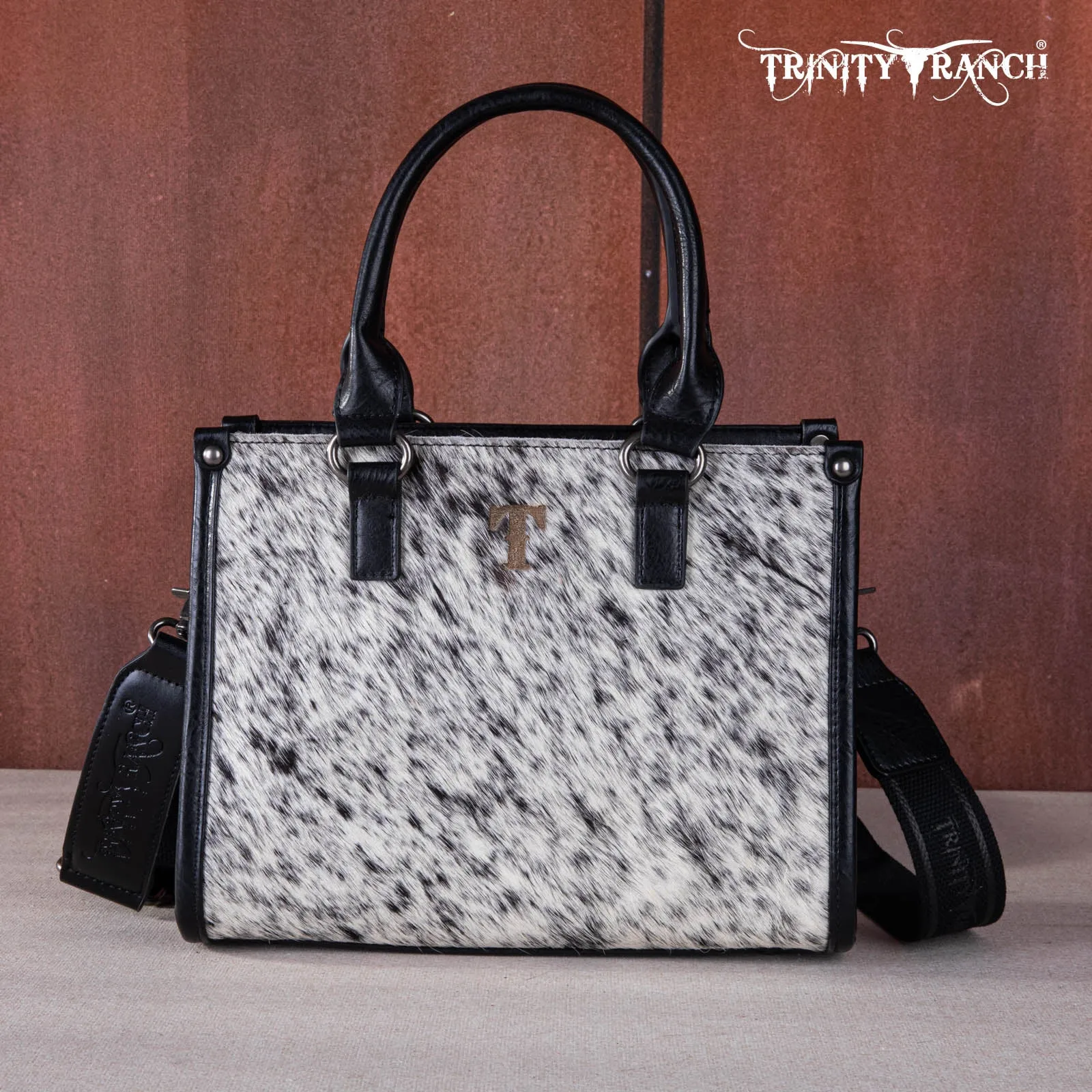 TR164-8250A  Trinity Ranch Hair On Cowhide Tooling Concealed Carry Tote/Crossbody