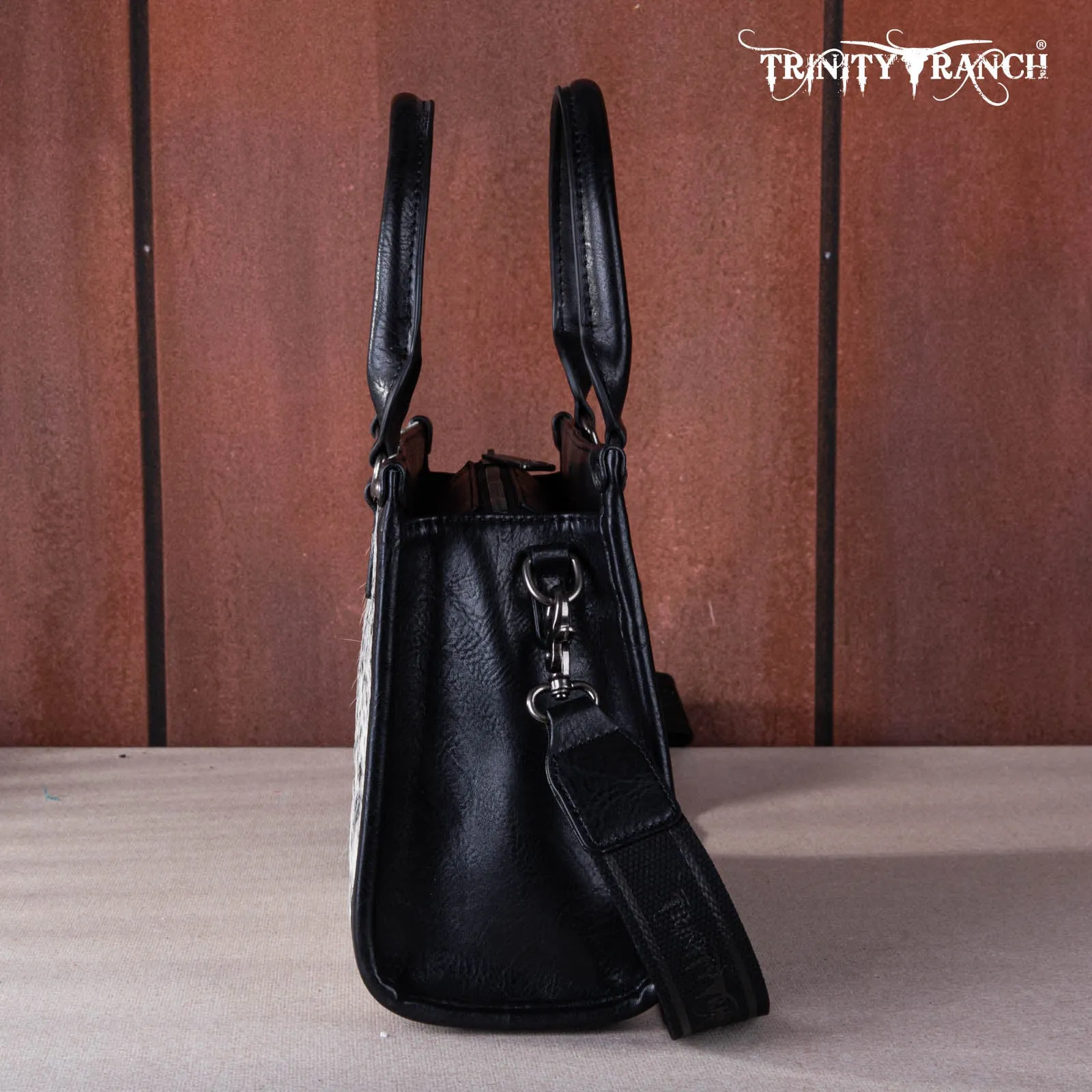 TR164-8250A  Trinity Ranch Hair On Cowhide Tooling Concealed Carry Tote/Crossbody
