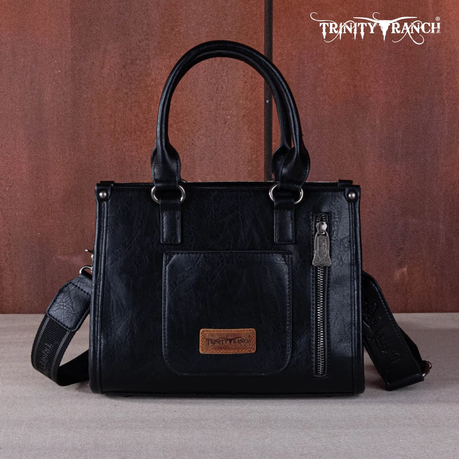 TR164-8250A  Trinity Ranch Hair On Cowhide Tooling Concealed Carry Tote/Crossbody