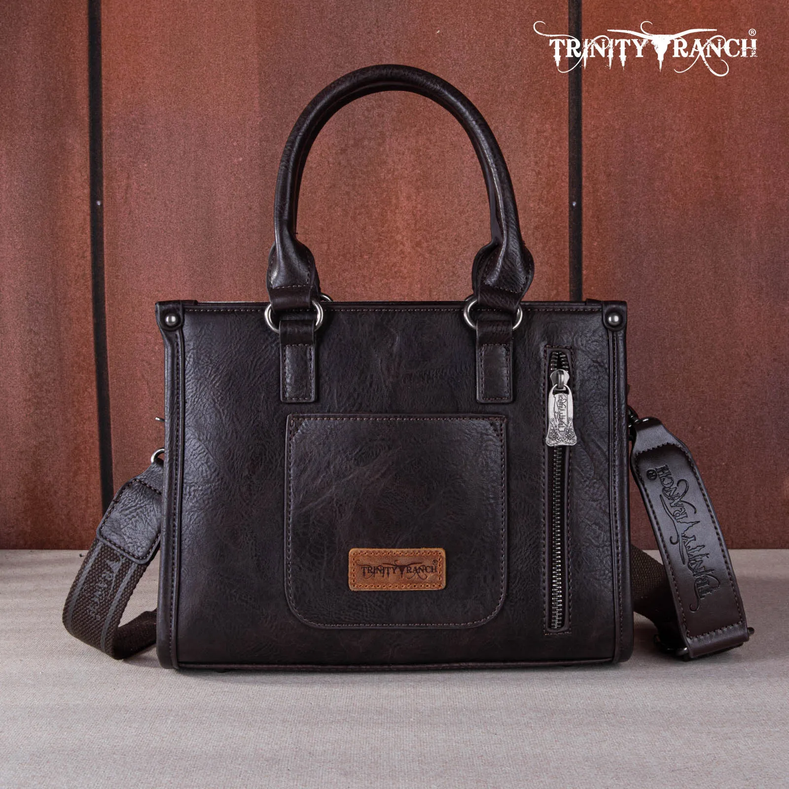 TR164-8250A  Trinity Ranch Hair On Cowhide Tooling Concealed Carry Tote/Crossbody